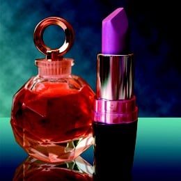 Bottles of Perfume and Lipstick