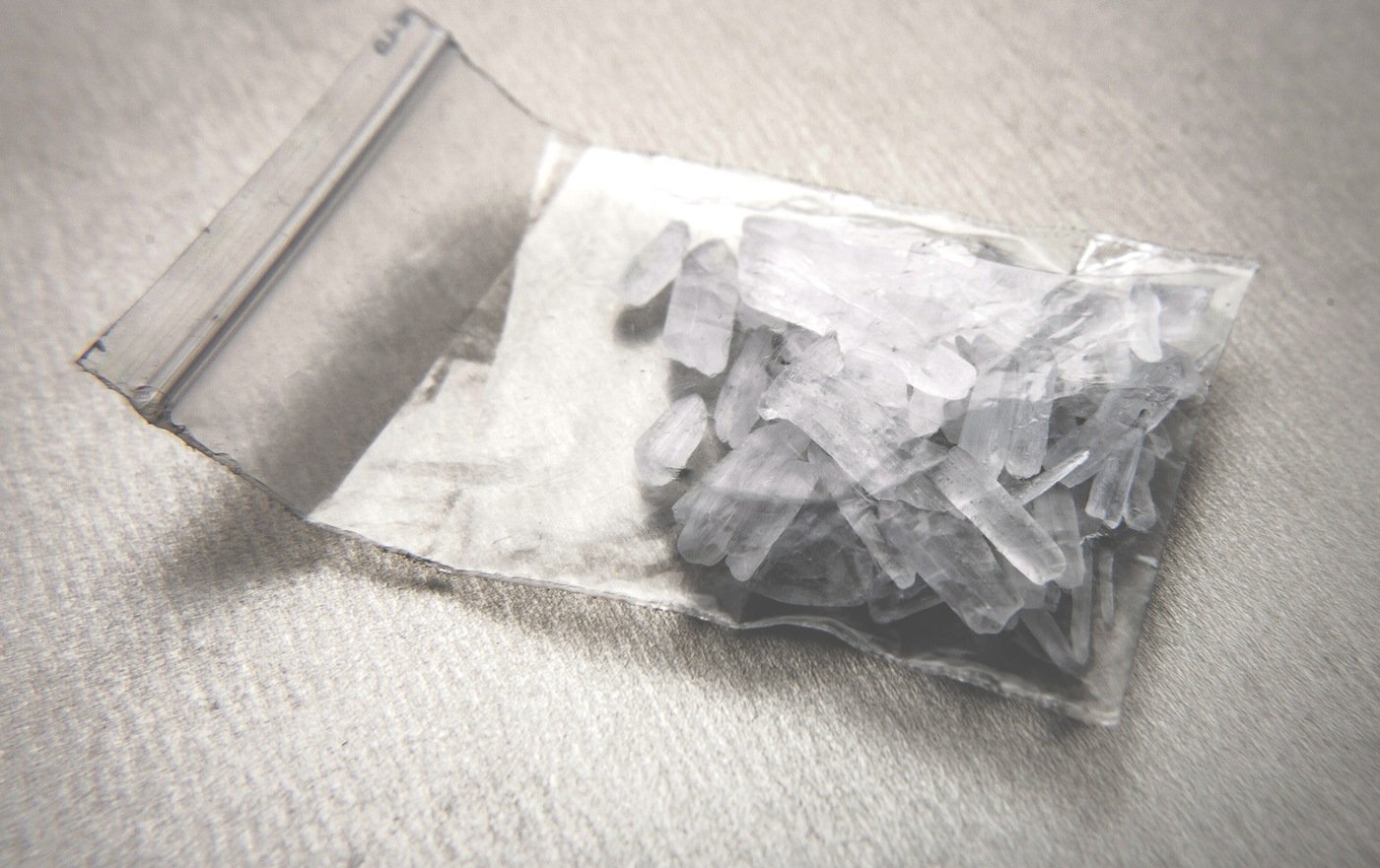 Stock image of a bag of methamphetamine in the form known as crystal meth.